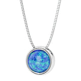 Round Blue Opal bezel set solitaire pendant in 14k white gold for women made in USA by Pel & Co Custom Jewelry