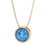 Round Blue Opal bezel set solitaire pendant in 14k yellow gold for women made in USA by Pel & Co Custom Opal Jewelry