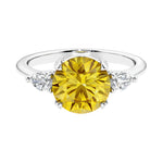 3 stone yellow canary diamond looking yellow sapphire and diamond engagement ring with round center, symbolizing past, present, and future, set in 14k white gold.