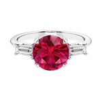 Lab diamond engagement ring in 14k white gold with round red ruby center and two matching diamonds for timeless beauty.
