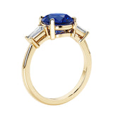 Round cut diamond ring in a 3 stone setting, one of our most loved female engagement rings.