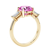 Round cut diamond ring in a 3 stone setting, one of our most loved female engagement rings.