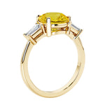 Round cut diamond ring in a 3 stone setting, one of our most loved female engagement rings.