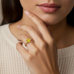 Woman wearing round engagement ring with diamonds, crafted for those seeking unique engagement rings with classic charm.