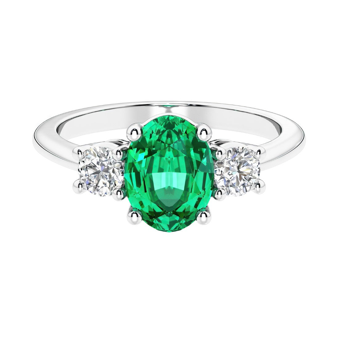 Three stone oval cut emerald gemstone and diamond ring in classic design.