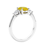 Oval cut three stone real yellow sapphire and diamond engagement ring with romantic charm.
