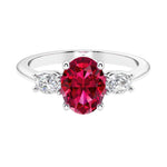 3 stone oval engagement ring with elegant proportions.