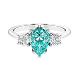 Paraiba Green Tourmaline 3 stone pear diamond ring set in a delicate band.