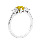 3 stone diamond engagement ring with pear shaped center in white gold featuring Yellow Diamond alternative yellow sapphire.