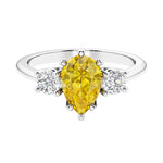 Yellow Diamond alternative yellow sapphire 3 stone pear diamond ring set in a delicate band.