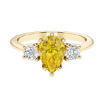 Yellow Diamond alternative yellow sapphire pear shaped 3 stone engagement ring with elegant diamond side stones.