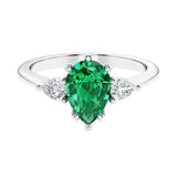 Green Emerald 3 stone pear diamond ring set in a delicate band.