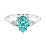 Paraiba Tourmaline 3 stone pear diamond ring set in a delicate band.