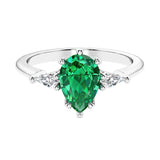 Green Gemstone 3 stone pear diamond ring set in a delicate band.