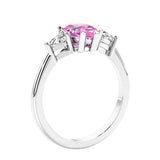 3 stone diamond engagement ring with pear shaped center in white gold featuring Pink Gemstone.