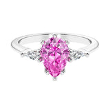 Pink Gemstone 3 stone pear diamond ring set in a delicate band.