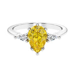 Yellow Gemstone 3 stone pear diamond ring set in a delicate band.