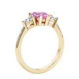 Pink Gemstone three stone pear shaped engagement ring with classic styling.