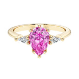 Pink Gemstone pear shaped 3 stone engagement ring with elegant diamond side stones.