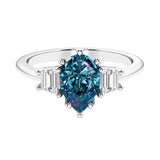 Alexandrite 3 stone pear diamond ring set in a delicate band.