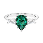 Green Emerald 3 stone pear diamond ring set in a delicate band.