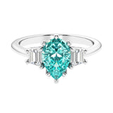 Paraiba Tourmaline 3 stone pear diamond ring set in a delicate band.