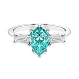 Paraiba Tourmaline 3 stone pear diamond ring set in a delicate band.
