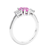 3 stone diamond engagement ring with pear shaped center in white gold featuring Pink Gemstone.