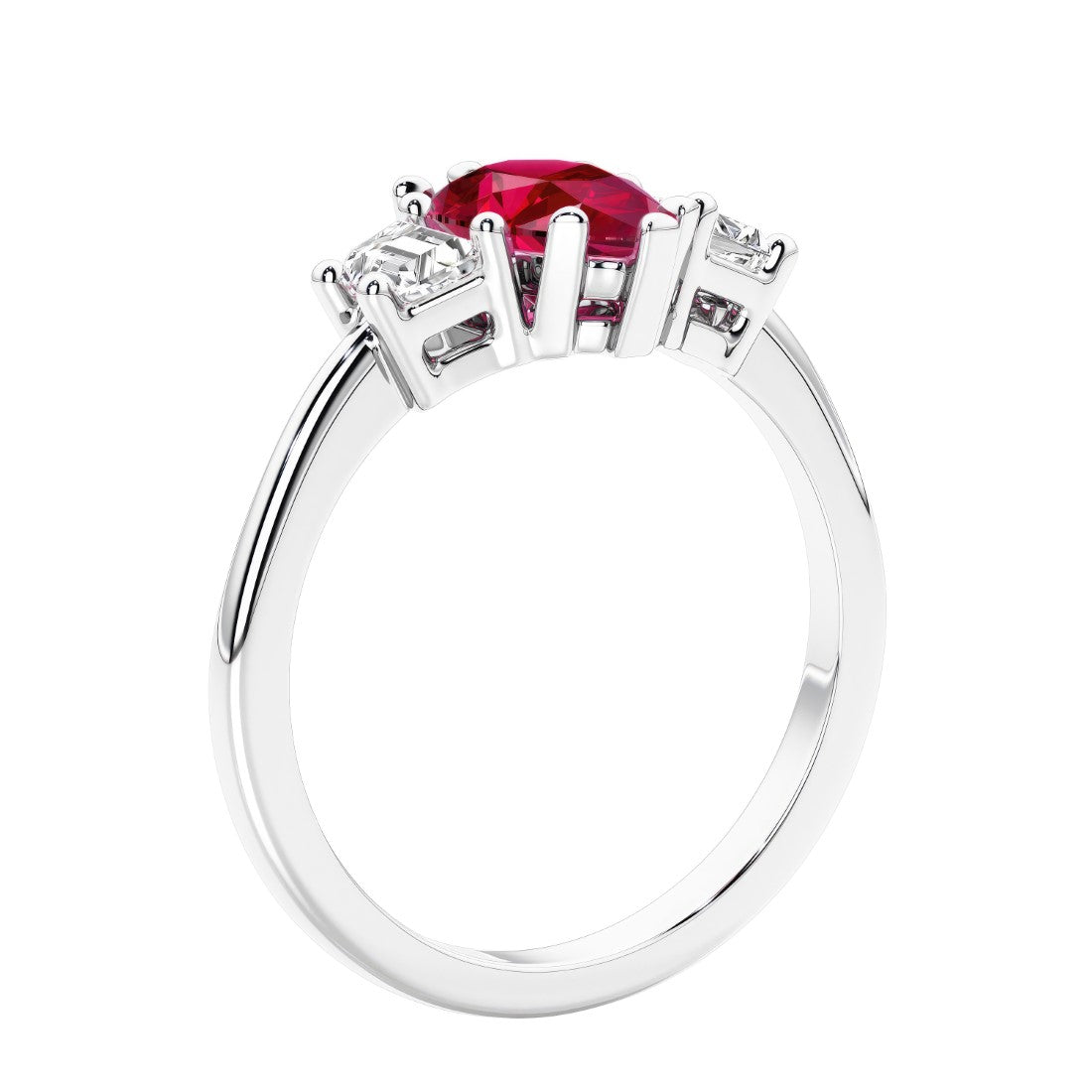3 stone diamond engagement ring with pear shaped center in white gold featuring Ruby.