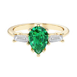 Colombian Green Emerald pear shaped 3 stone engagement ring with elegant diamond side stones.