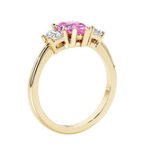 Pink Gemstone three stone pear shaped engagement ring with classic styling.