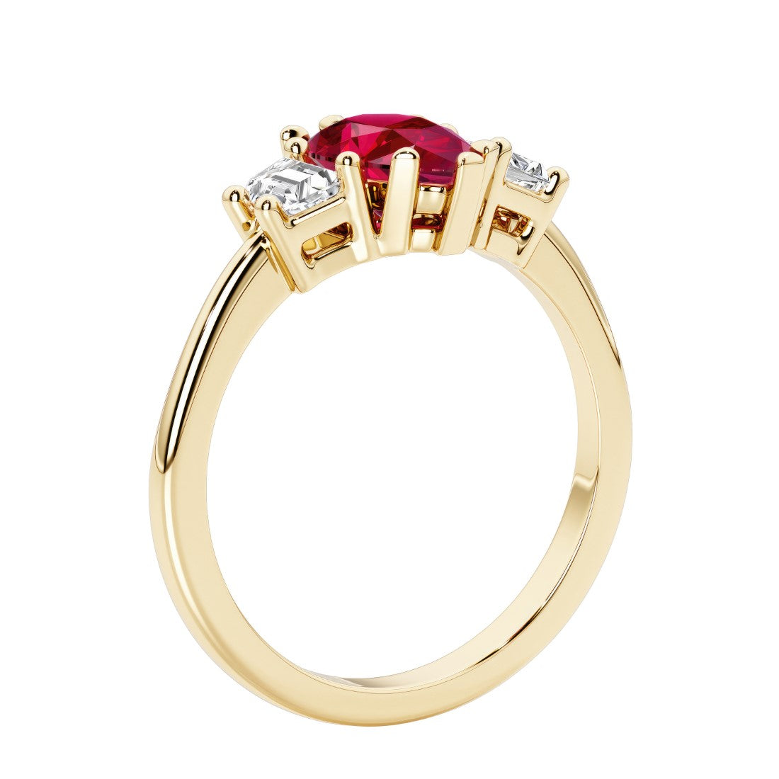 Ruby three stone pear shaped engagement ring with classic styling.