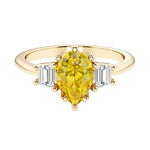 Yellow diamond pear shaped 3 stone engagement ring with elegant diamond side stones.