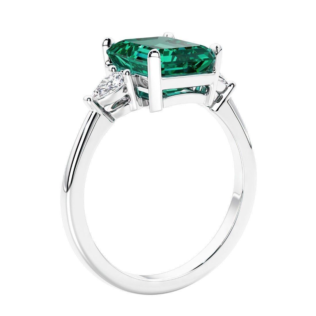 3 stone emerald cut diamond ring in modern gold setting with gemstone center.