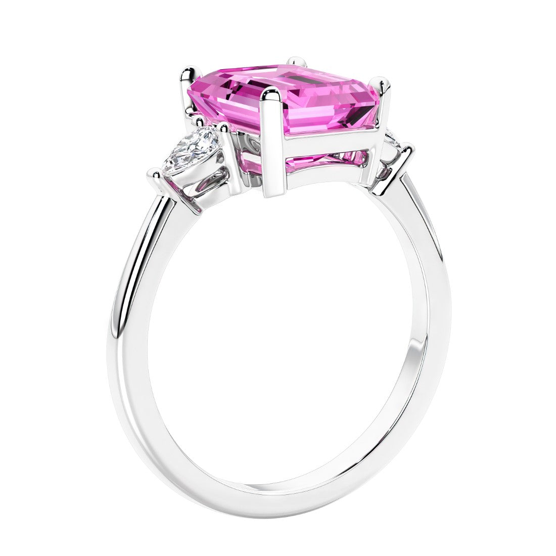 3 stone emerald cut diamond ring in modern gold setting with gemstone center.