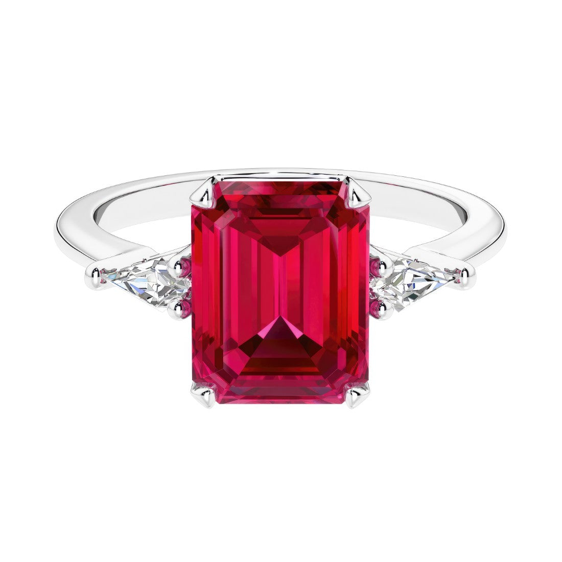 Three stone emerald cut engagement ring for timeless elegance featuring red gemstone and diamonds.