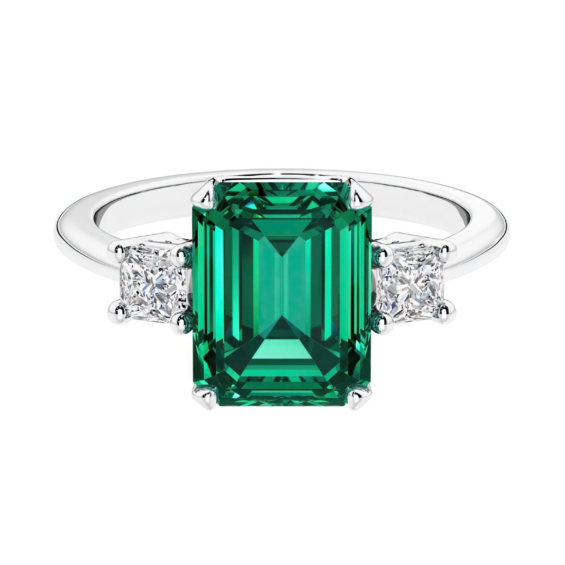 Three stone emerald cut engagement ring for timeless elegance featuring green gemstone and diamonds.