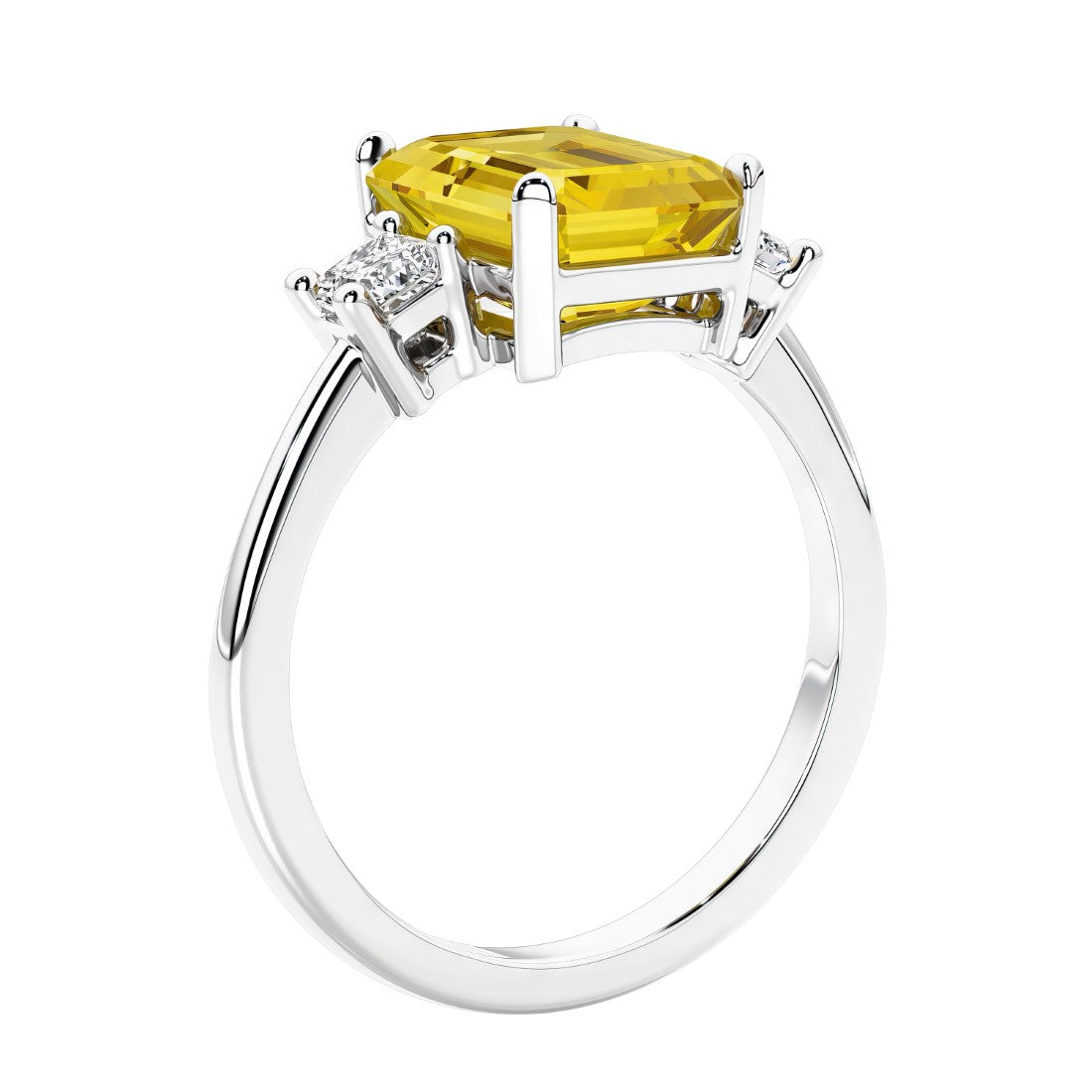 3 stone emerald cut diamond ring in modern gold setting with yellow gemstone center.