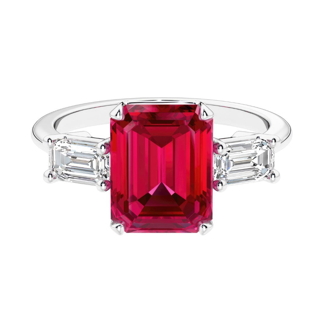 Three stone emerald cut engagement ring for timeless elegance featuring red gemstone and diamonds.