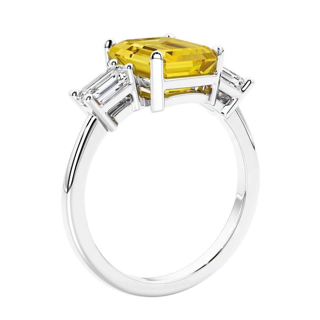 3 stone emerald cut diamond ring in modern gold setting with yellow gemstone center.