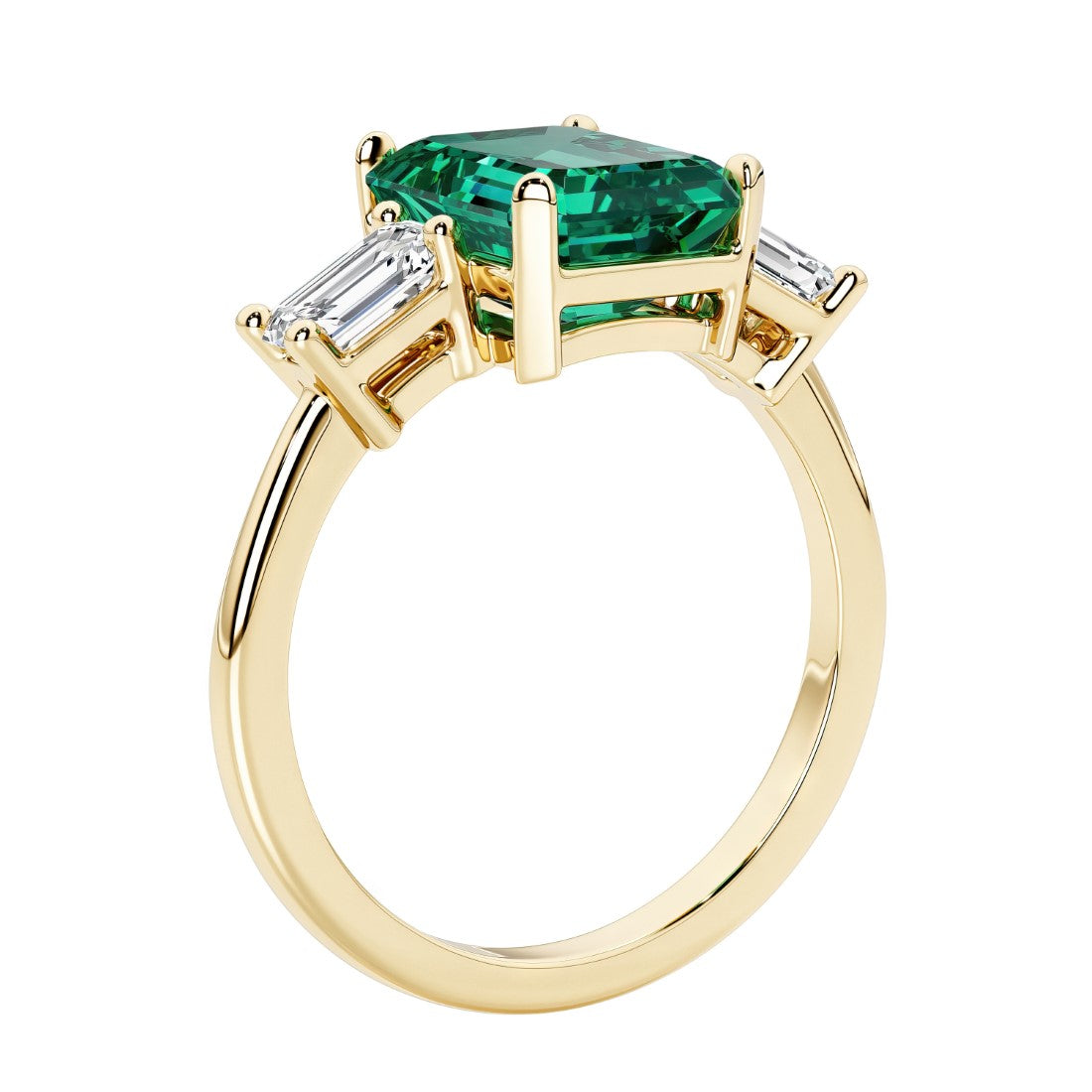 Emerald cut 3 diamond ring representing past, present, and future featuring green gemstone center.