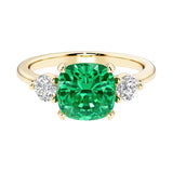 Cushion cut 3 stone engagement ring with soft corners and vintage charm.
