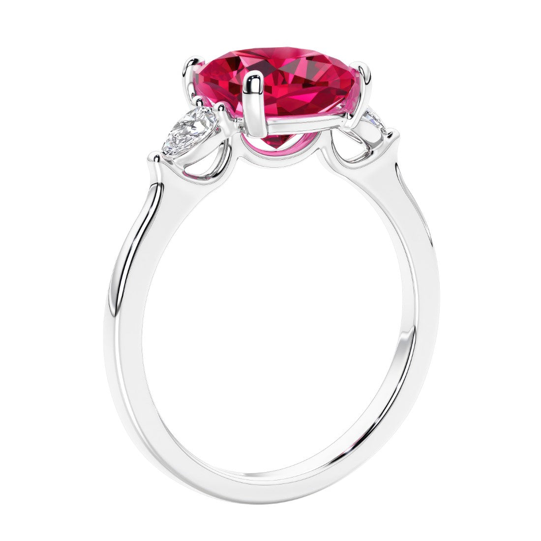 Cushion cut diamond ring as a unique engagement ring featuring three stone design with red ruby and diamonds.