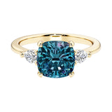 Cushion cut 3 stone engagement ring with soft corners and vintage charm.