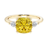 Cushion cut 3 stone engagement ring with soft corners and vintage charm.