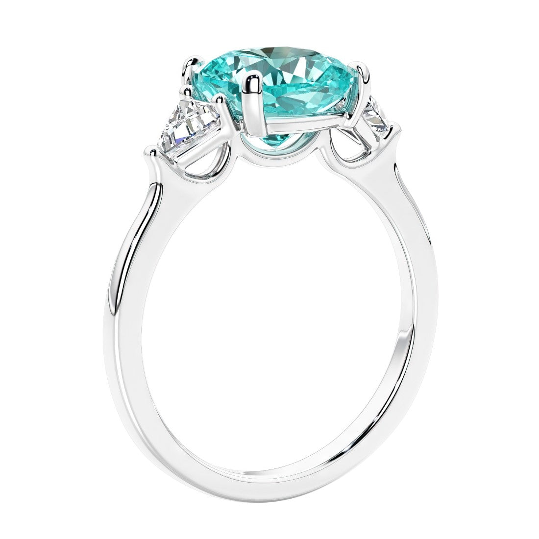 Cushion cut diamond ring as a unique engagement ring featuring three stone design with paraiba tourmaline and diamonds.
