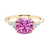 Cushion cut 3 stone engagement ring with soft corners and vintage charm.