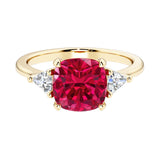 Cushion cut 3 stone engagement ring with soft corners and vintage charm.