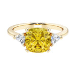 Cushion cut 3 stone engagement ring with soft corners and vintage charm.