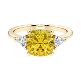 Cushion cut 3 stone engagement ring with soft corners and vintage charm.